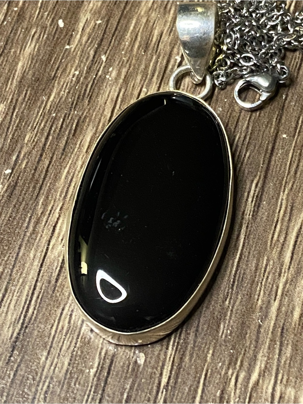 Black Oval Onyx Pendant Necklace in Silver-Tone Bezel